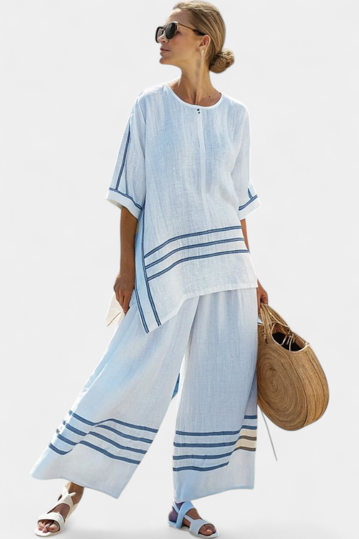Eden – Sophisticated Striped Asymmetric Top and Bold Trousers