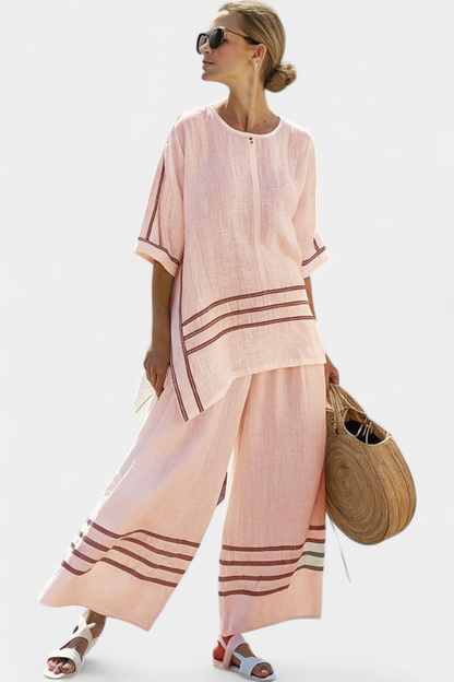 Eden – Sophisticated Striped Asymmetric Top and Bold Trousers
