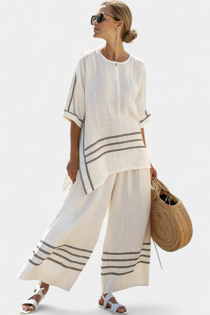 Eden – Sophisticated Striped Asymmetric Top and Bold Trousers