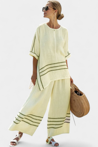 Eden – Sophisticated Striped Asymmetric Top and Bold Trousers