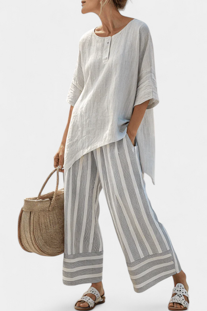 Elle – Elegant Asymmetric Blouse and Striped Trousers