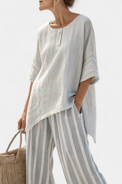 Elle – Elegant Asymmetric Blouse and Striped Trousers